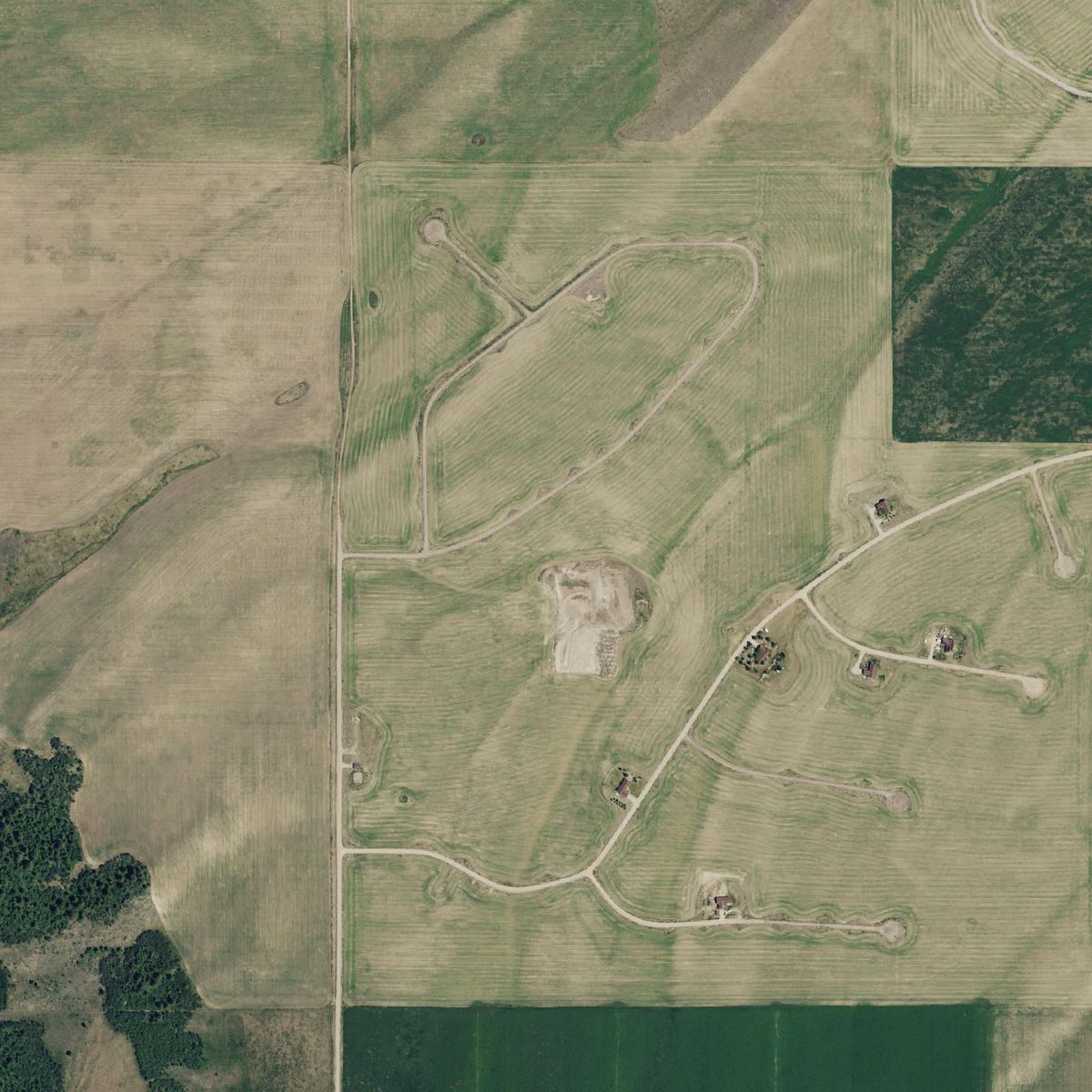 Aerial photo of West Ridge Ranch showing the Fawn Ridge Lane loop, Rose Ridge Lane and surrounding farmland