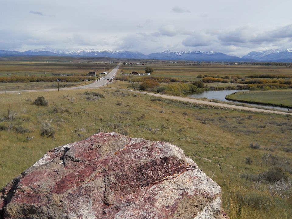 Teton Valley, Idaho in fall with a winding road and river